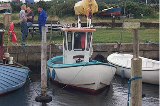 littleboat.jpg (28335 bytes)